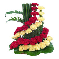Send Red Yellow Carnation Arrangement 50 Flowers in Mumbai to your Known on Friendship Day