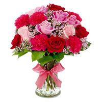 Deliver Red Carnation Pink Red Rose in Vase 12 Flowers to Mumbai on Rakhi