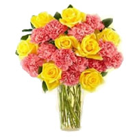Send Rakhi with Flowers to Mumbai. Online Pink Carnation Yellow Rose in Vase 24 Flowers to Mumbai