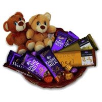 Place Order for Christmas Gifts Online to Mumbai Consist of Twin Teddy Basket of Chocolate in Mumbai