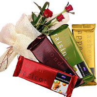 New Year Gifts Delivery in Mumbai delivers 4 Cadbury Temptation Chocolates With 3 Red Roses to Vashi.