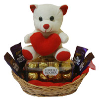 Online Gift to Mumbai. 4 Dairy Milk 16 Ferrero Rocher Chocolates and 6 Inch Teddy Basket