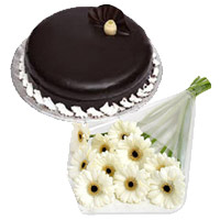 Deliver Online 12 White Gerbera 1 Kg Chocolate Truffle Cake with other yummy Diwali cakes to Mumbai
