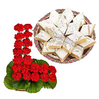 Deliver Gifts in Mumbai. 24 Red Carnation Basket with 1/2 Kg Kaju Burfi
