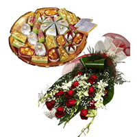 Deliver New Year Flowers in Mumbai inclusive of 6 White Orchids 12 Red Roses Bunch 1 Kg Assorted Kaju Sweets in Mumbai