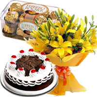 Deliver 12 Yellow Lily with 1/2 Kg Black Forest Cake in Mumbai and 16 Pcs Ferrero Rocher to Mumbai. Diwali Gifts in Akola