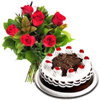 Deliver Diwali Cakes to Mumbai that includes 6 Red Roses with 1/2 Kg Black Forest Cake in Panval