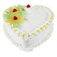 New Year Cakes in Mumbai including 1 Kg best Eggless Heart Shape Pineapple Cake in Mumbai.