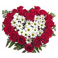 Buy Christmas Flowers in Mumbai Same Day Delivery consisting White Gerbera Red Roses Heart 50 Flowers in Pune