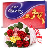 New Year Gifts in Akola consist of 12 Mix Roses Bouquet with Cadbury Celeberation Pack