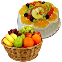 Online Deepawali Gifts Delivery in Mumbai of 1 Kg Fresh Fruits Basket with 500 gm Fruit Cake in Mumbai