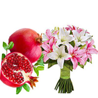 Bhaidooj Gifts Delivery to Mumbai be composed of 1 Kg Fresh Promegranate with Pink White Lily Bouquet 6 Stems