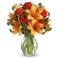 Online Diwali Flowers Delivery in Pune of Orange Lily Red Roses in Vase 12 Flowers to Mumbai