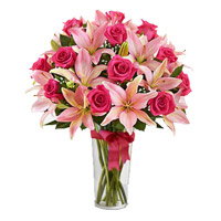 Order Online Flower Delivery in Mumbai. 4 Pink Lily 15 Pink Rose in Vase on Rakhi