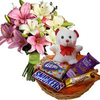 New Year Gifts Delivery in Mumbai with Cookies. 6 Pink White Lily with 6 Inches Teddy and Chocolate Basket.