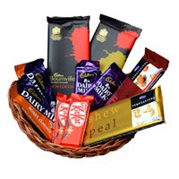 Deliver New Year Gifts in Mumbai constuting Basket of Assorted Chocolates in Akola