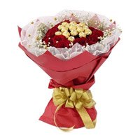 Online Gift Delivery of 16 Pcs Ferrero Rocher Chocolate encircled with 20 Red Roses