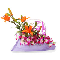 New Year Send Flower to Mumbai Midnight Delivery along with 9 Orchids 3 Lily Arrangement