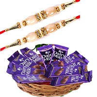 Send Gifts to Mumbai Online that includes Dairy Milk Basket 12 Chocolates With 12 Pink Roses on Rakhi