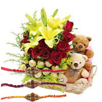 Best Rakhi Gift Delivery to Mumbai including 2 Lily 12 Roses with 16 Ferrero Rocher and Twin Small Teddy Basket