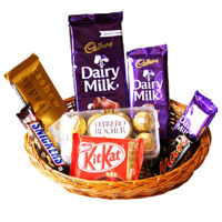 Send New Year Gifts in Mumbai including Celebrate  With Basket of Chocolate in Mumbai