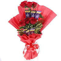 Exclusively Diwali Gifts in Mumbai additionally 16 Pcs Ferrero Rocher with 24 Red White Roses Flowers Bouquet to Thane