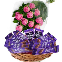 Send New Year Gifts in Mumbai contains 12 Pink Roses to Mumbai witn Dairy Milk Basket 12 Chocolates in Vashi