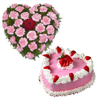Send Best New Year Flowers to Mumbai with 36 Pink Carnation Flowers in Heart Shape with 1 Kg Heart Strawberry Cake in Nagpur