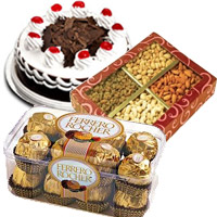 Place Order for 1/2 Kg Black Forest Cake, 1/2 Kg Dry Fruits and 16 pcs Ferrero Rochers Mumbai : Online Anniversary Gifts to Mumbai