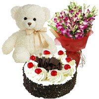 Place Order for New Year Gifts Delivery in Mumbai contain Bouquet of 10 Orchids with 6 inch Teddy and 1 kg Black Forest Cake in Mumbai